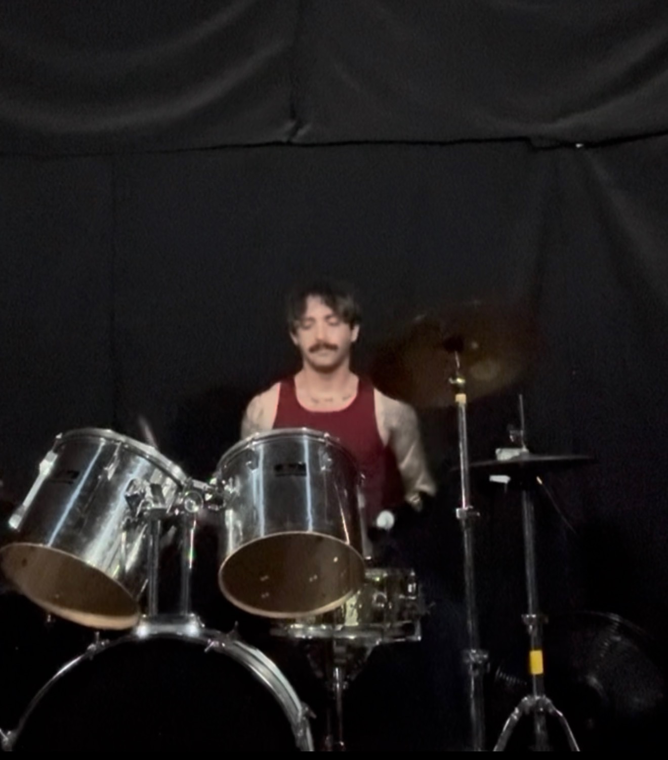 Josh, drummer with adaptive drumming prosthetic